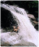 June in the first waterfall on the walk from Casa Cubuy